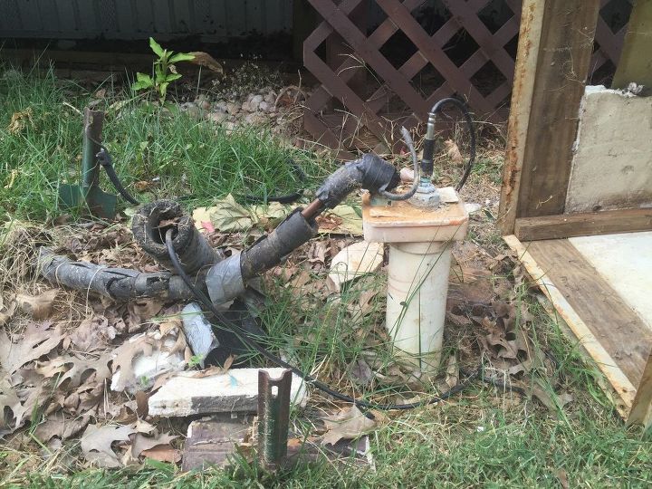 q i need some inexpensive diy ideas on how to hide this water access, gardening, landscape, It s about 24 inches long