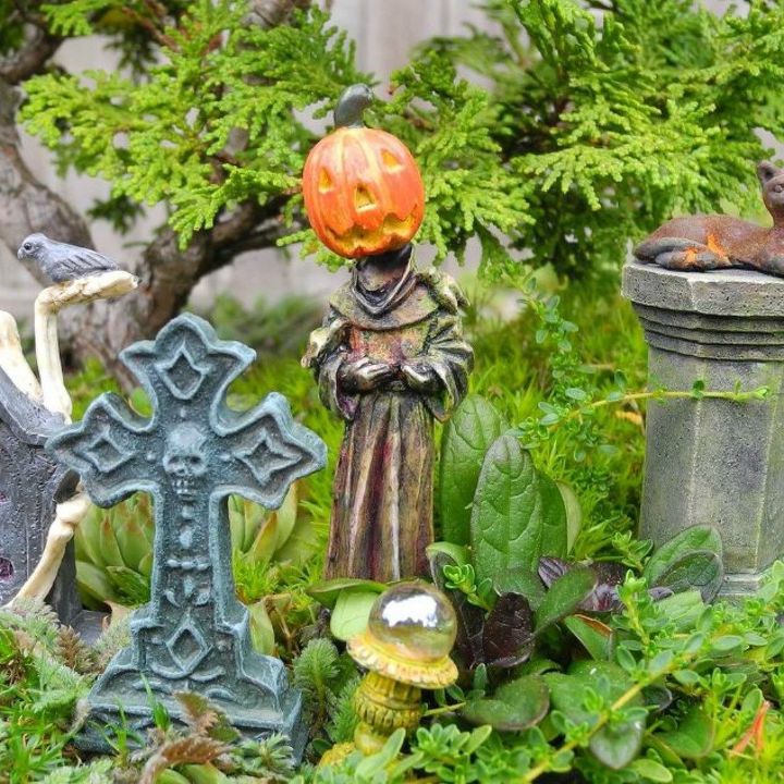 make your neighbors giggle with these 9 halloween fairy garden ideas, Use mini pumpkin heads in a fairy graveyard