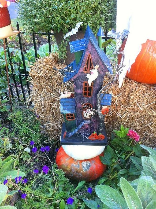 make your neighbors giggle with these 9 halloween fairy garden ideas, Change up your garden with a haunted house