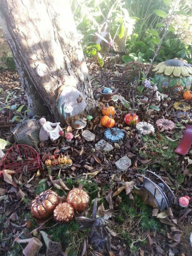 make your neighbors giggle with these 9 halloween fairy garden ideas, Use outdoor leaves for a fall themed garden