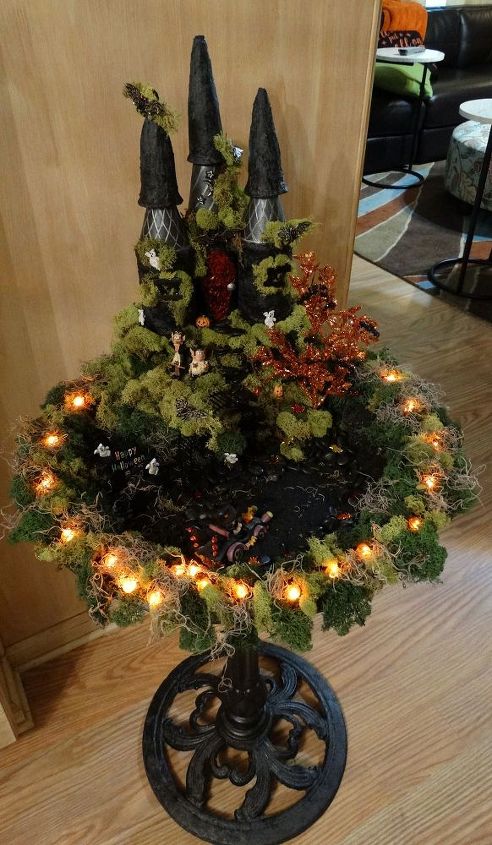 make your neighbors giggle with these 9 halloween fairy garden ideas, Fill an old birdbath with a haunted castle