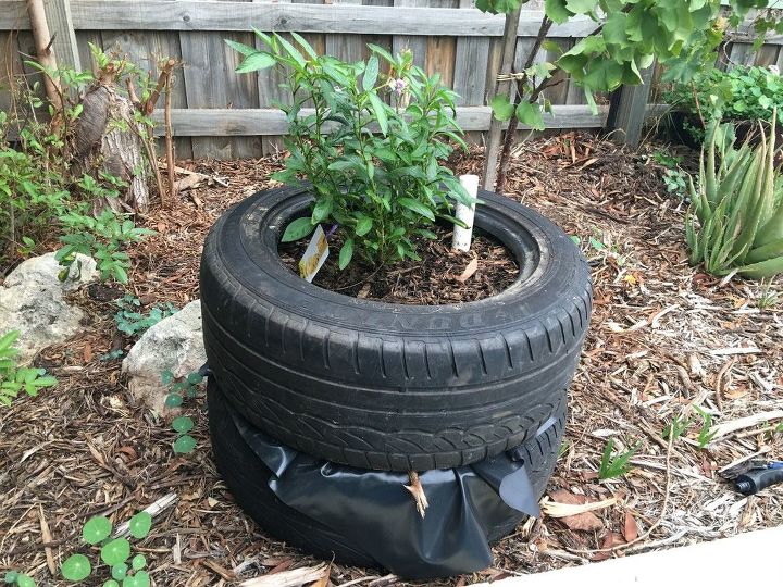 como criar um jardim de pavio de pneus