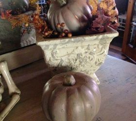 s 10 spook tacular ways to dress up your dollar store pumpkins, halloween decorations, seasonal holiday decor, Give them a chic look with metallic paint
