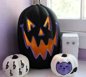 s 10 spook tacular ways to dress up your dollar store pumpkins, halloween decorations, seasonal holiday decor, Give them a spooky look with back and purple