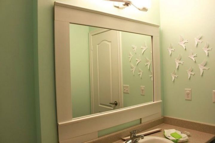 10 stunning ways to transform your bathroom mirror without removing it, Use construction adhesive to hold boards