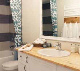 10 stunning ways to transform your bathroom mirror without removing it, Pin thumbtacks to moldings for some shine