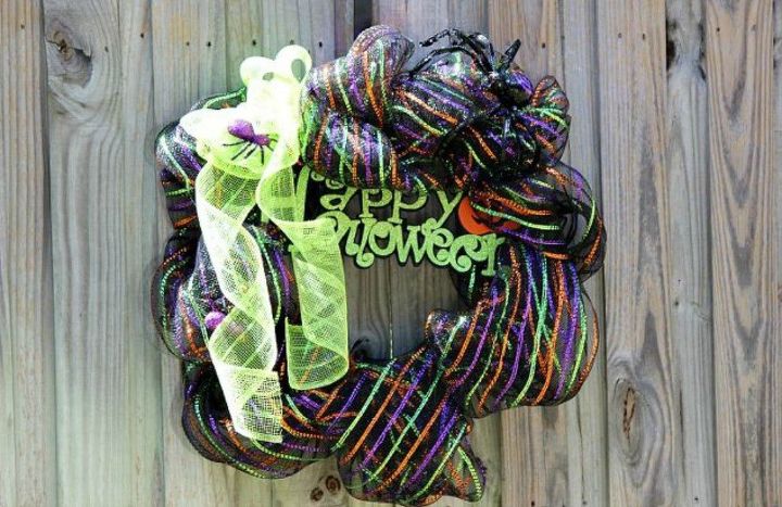 s pinch mesh into shapes for these beautiful holiday d cor ideas, home decor, A neon Halloween wreath