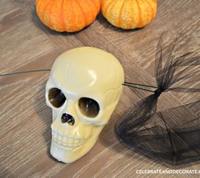diy dollar store skull halloween garland, halloween decorations, seasonal holiday decor