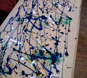 vibrant splatter took this 80 s dresser to new heights , painted furniture