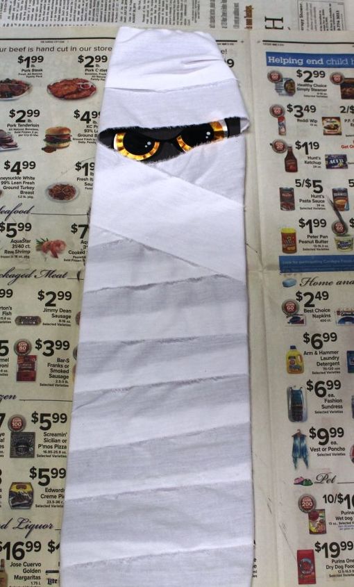 make a halloween mummy from a ceiling fan blade, halloween decorations, repurposing upcycling, seasonal holiday decor, wall decor