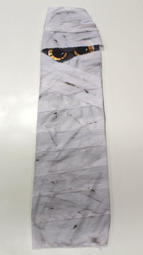 make a halloween mummy from a ceiling fan blade, halloween decorations, repurposing upcycling, seasonal holiday decor, wall decor, Finished mummy
