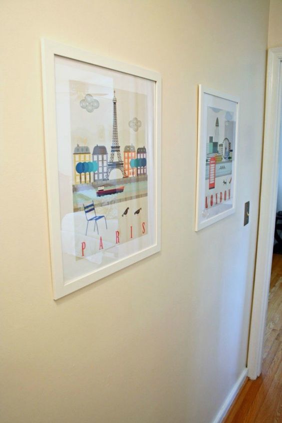 s if your hallway is dark here is what you re missing, foyer, Hang up framed travel prints