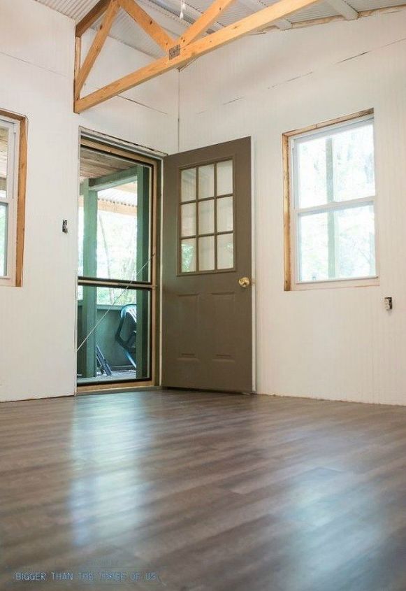 s shock your guests with these shoe string budget flooring ideas, flooring, Install laminate flooring with a wood texture