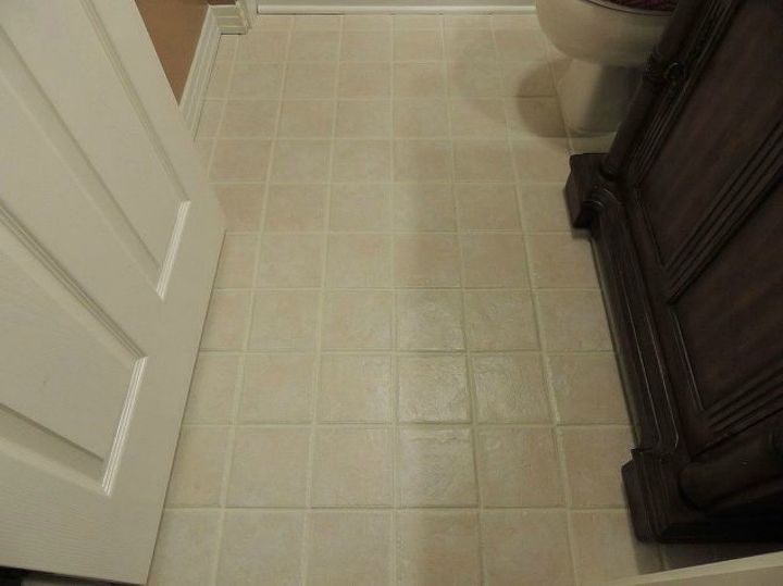 s shock your guests with these shoe string budget flooring ideas, flooring, Paint the grout to give your tile a new look