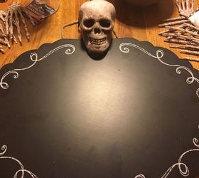 halloween chalk board, chalkboard paint, crafts, halloween decorations, seasonal holiday decor, Add the skull with hot glue
