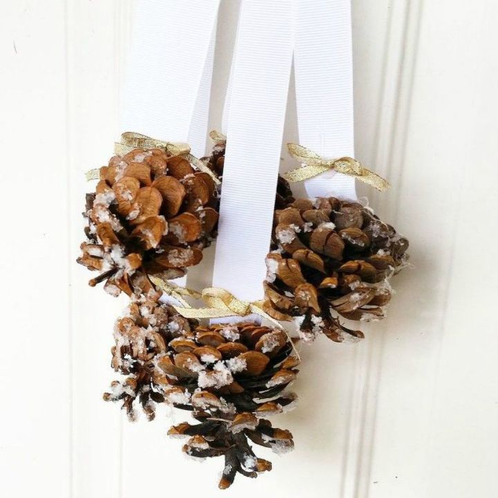 s tired of wreaths try these ideas instead , crafts, wreaths, Tie some pinecones to ribbons