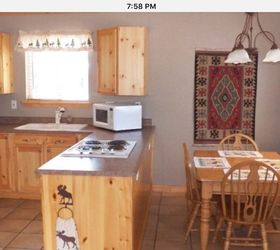 cabin kitchen and dining space renovation diy, kitchen design, The before photo from realtor com