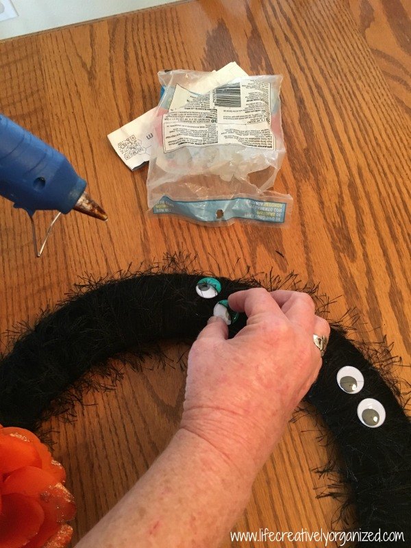 spooky eyeball halloween wreath, crafts, halloween decorations, seasonal holiday decor, wreaths