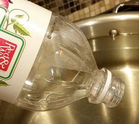 Pour vinegar and dish soap into a pot to clean your grossest kitchen spot