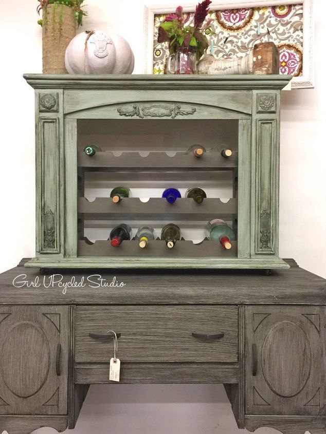 fireplace is beautifully upcycled into an aged wine rack, fireplaces mantels