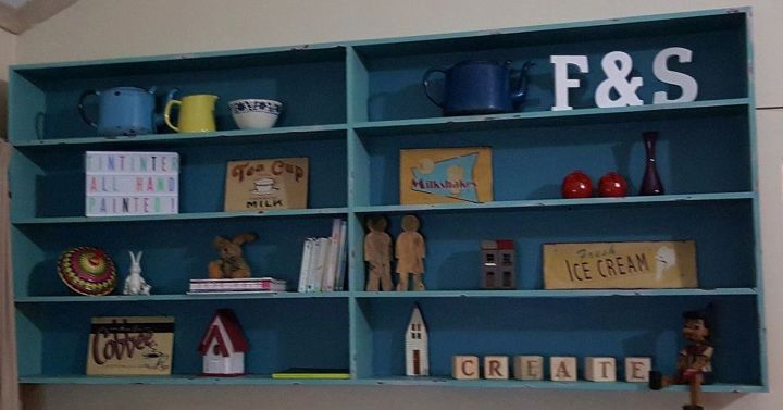 giving a dark bookshelf a brighter look, shelving ideas, storage ideas