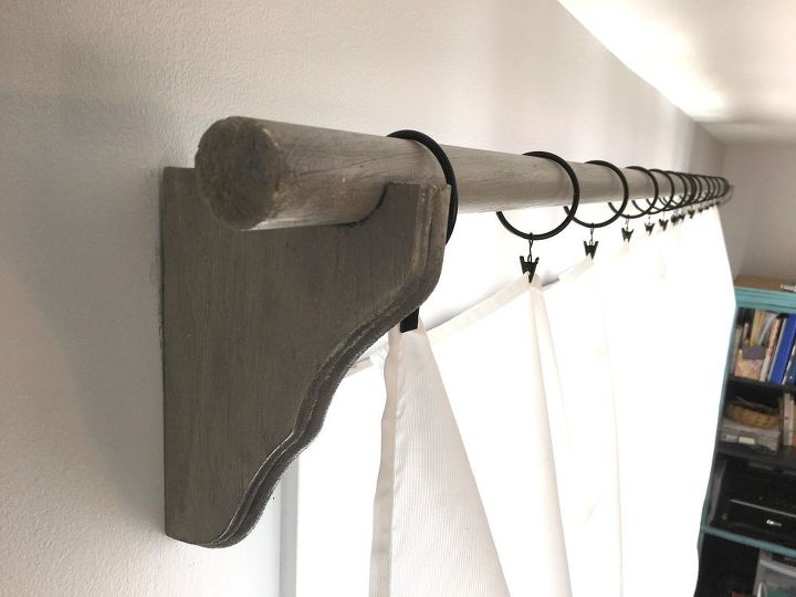 rustic curtain rod corbels with sheet curtains