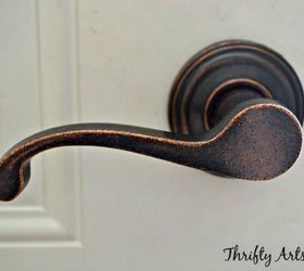 s 10 easy ways to fix your old door in under an hour, doors, Paint over your outdated brass knobs