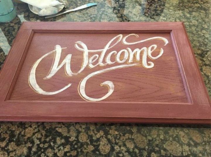 s rip off your cabinet doors for these brilliant upcycling ideas, doors, kitchen cabinets, kitchen design, Paint it for a warming welcome sign