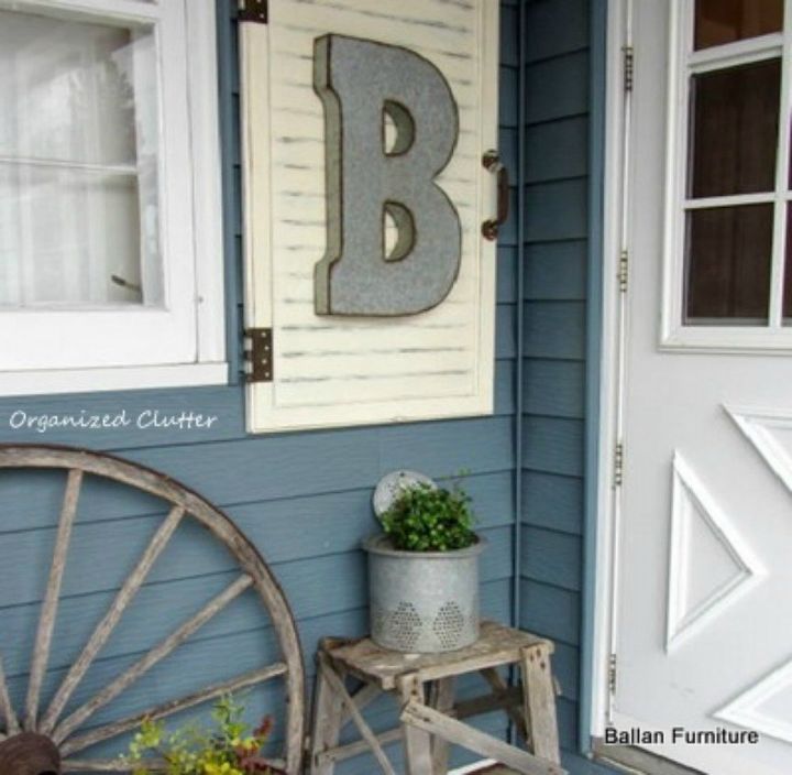 s rip off your cabinet doors for these brilliant upcycling ideas, doors, kitchen cabinets, kitchen design, Turn in into outdoor wall art