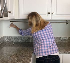 declutter kitchen countertop with a curtain rod