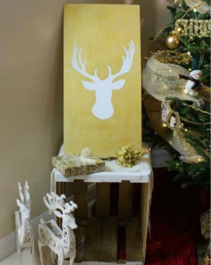 s get a designer living room without stepping foot in west elm, Grab a piece of wood for a reindeer art piece