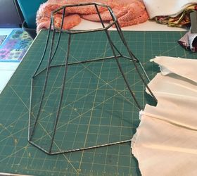 new life for a busted lamp shade with chicken wire