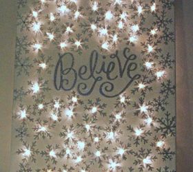 s hang your christmas lights in these 10 breathtaking spots, On a lighted Christmas canvas sign
