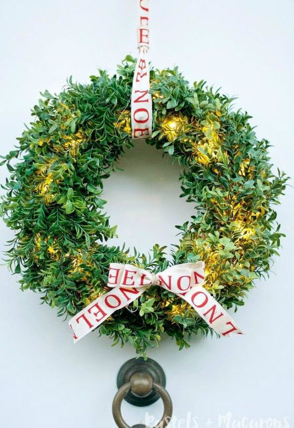s hang your christmas lights in these 10 breathtaking spots, On your door in a boxwood wreath