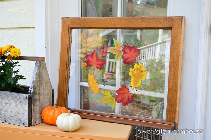 pinte folhas em uma janela velha para uma guirlanda nica
