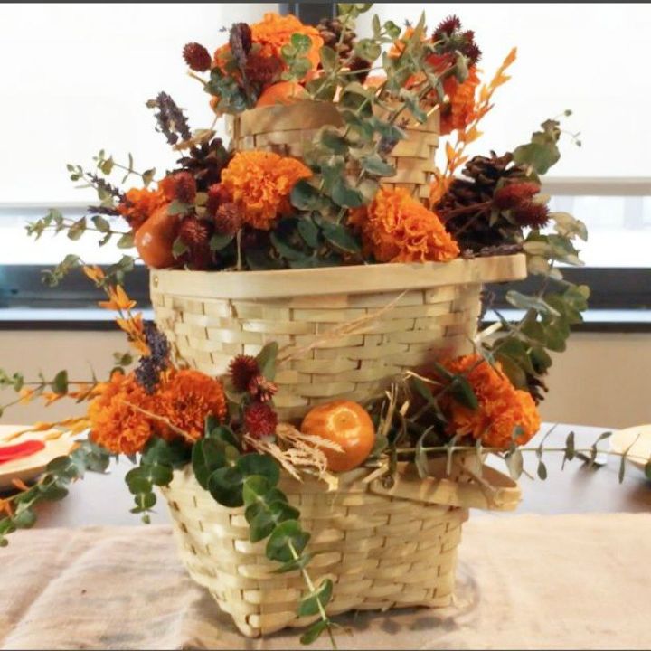 grab an old basket for these clever household ideas, Stack it into a fall centerpiece