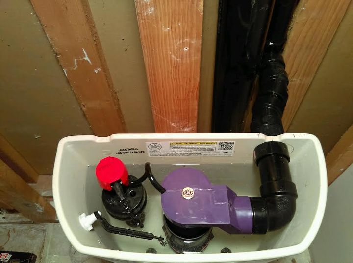 a family affair father in law helps couple mg equip their bathroom, bathroom ideas, Viola This toilet is now MG Equipped