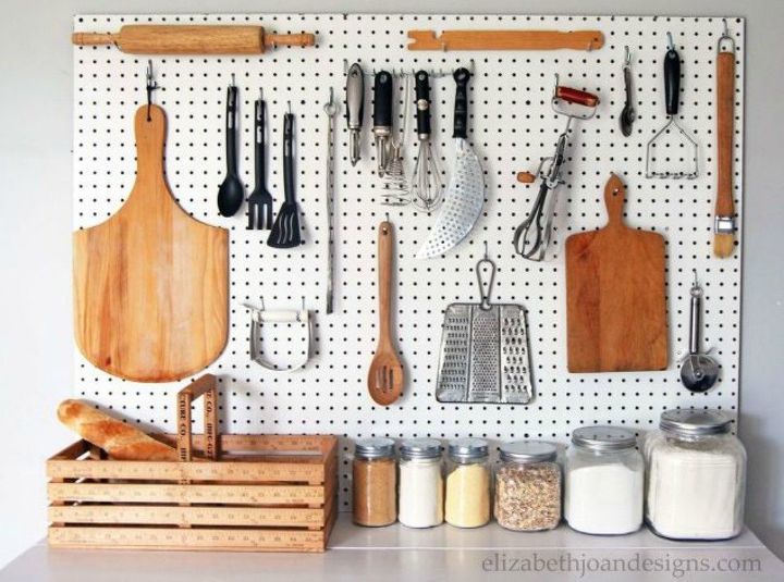 13 storage ideas that will instantly declutter your kitchen drawers, Hang everything on a pegboard wall
