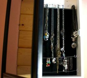 21 jewelry organizing ideas that are better than a jewelry box, This hidden jewelry cabinet with a mirror
