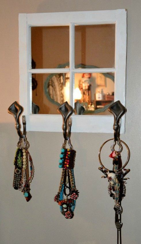 21 jewelry organizing ideas that are better than a jewelry box, This organizer with shower curtain hooks