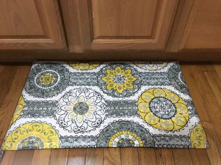 s transform dollar store rugs with these 11 stunning ideas, reupholster, Turn ugly rugs into durable kitchen mats