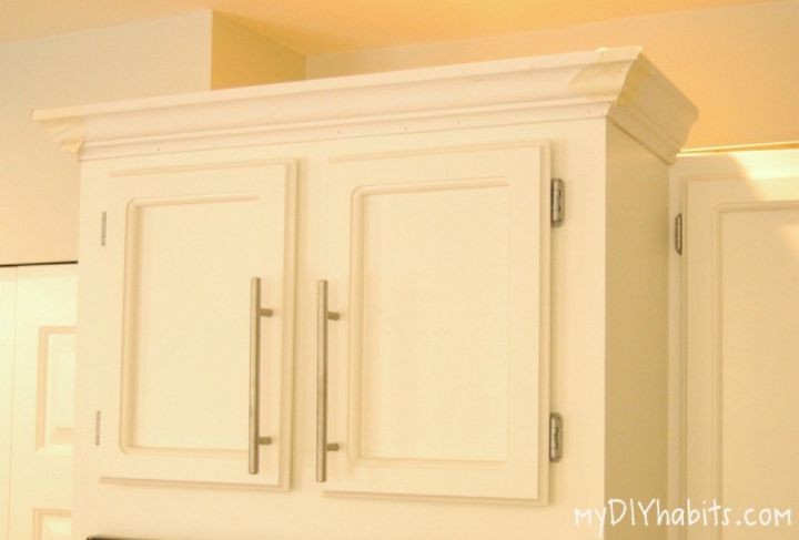 s transform your kitchen cabinets without paint 11 ideas , kitchen cabinets, kitchen design, Install some molding on the top