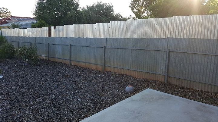 how can i cover up my side fence, The side of my backyard