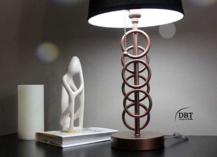14 blah to beautiful lamp ideas to transform your entire living room, Dress up a simple base with bottle rings