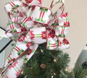 s don t stop at ornaments these tree decorating ideas are even better, christmas decorations, seasonal holiday decor, Tie a stunning bow out of ribbon