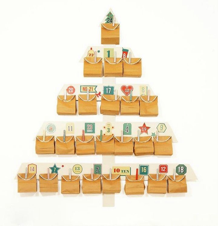 s 25 advent calendar ideas that are so cute, This wall one with brown paper bags