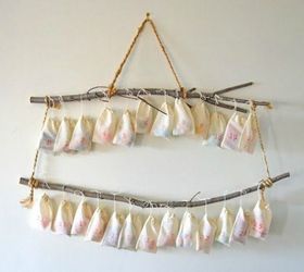 s 25 advent calendar ideas that are so cute, This one hanging from two branches
