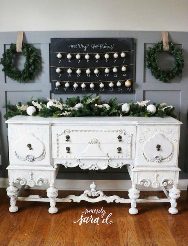 s 25 advent calendar ideas that are so cute, This painted canvas one with mini ornaments