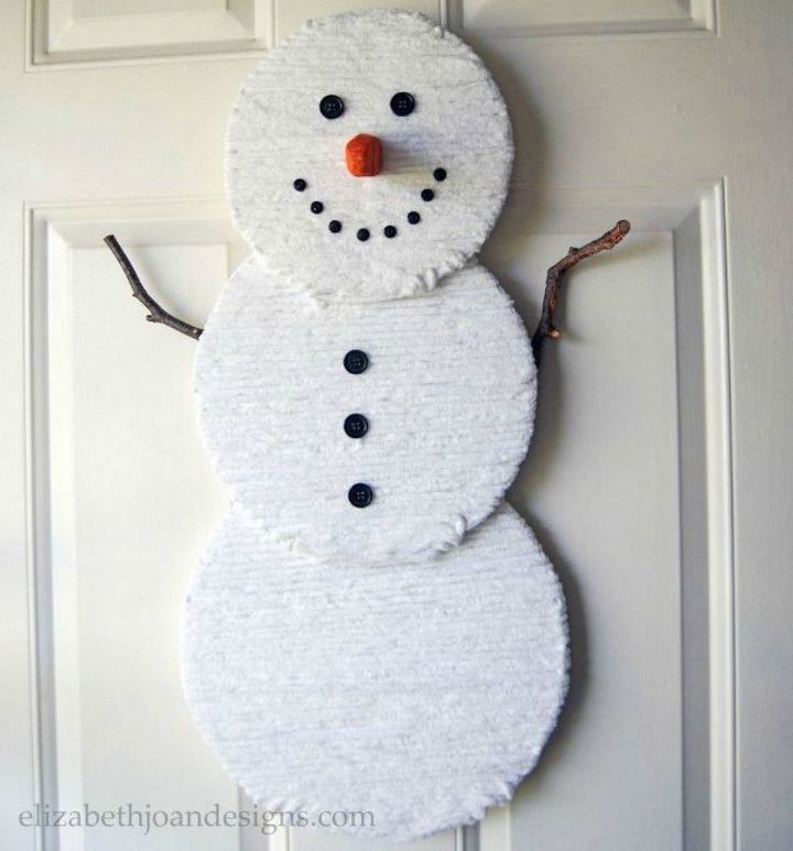 s 13 surprising ways to make a snowman for your porch, Glue white yarn on circular boards