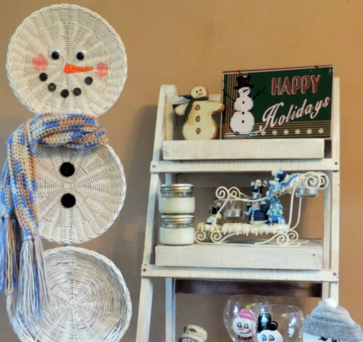 s 13 surprising ways to make a snowman for your porch, Paint some thrift store baskets white